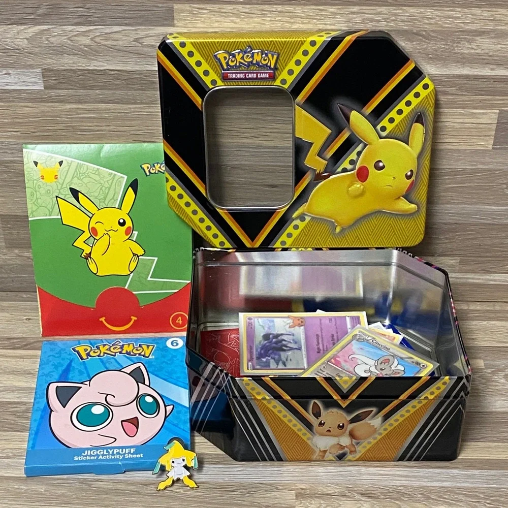 Pokemon Pikachu Yellow and Black Card Tin filled with cards and Pokémon pin